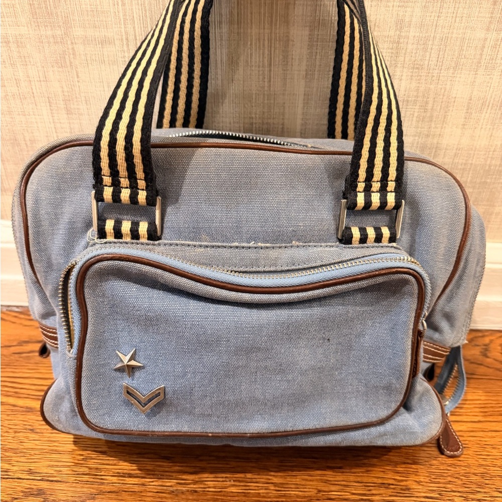 Marc Jacob’s Stylish Blue Denim Bag with Striped Handles